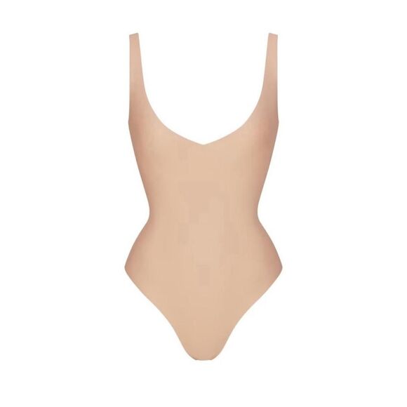 NWT SKIMS BODY UNLINED PLUNGE THONG BODYSUIT - Size L | Clay - Picture 1 of 3